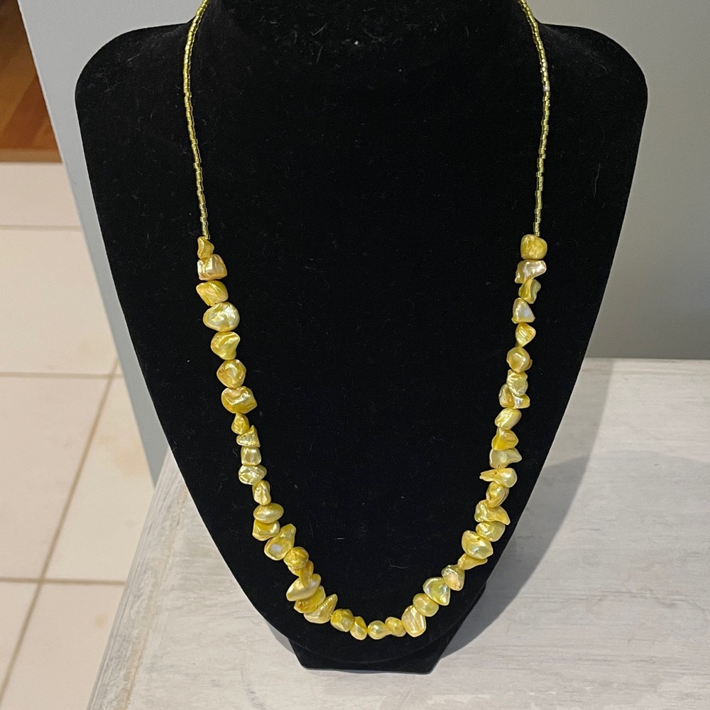 Gorgeous handcrafted yellows freshwater pearl necklace.
